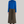 Charger l&#39;image dans la galerie, Young woman with short black hair stands confidently wearing a cobalt blue turtleneck and long brown wool skirt with a bias cut. She completes her look with brown boots and gold necklace
